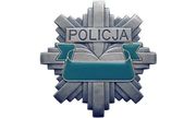Policyjna odznaka z napisem Policja